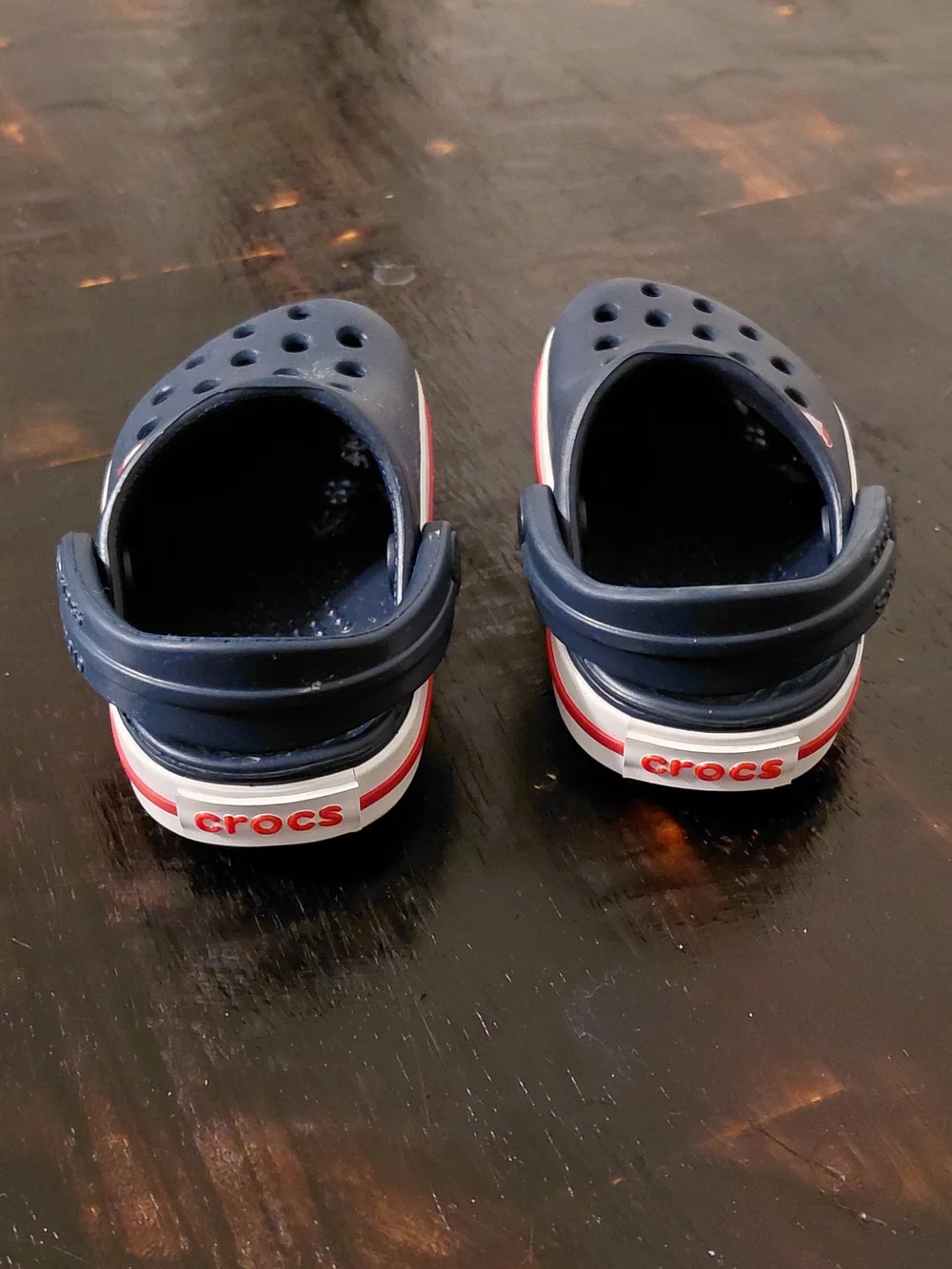 CROCS Kids Navy Clogs with White and Red Trim
